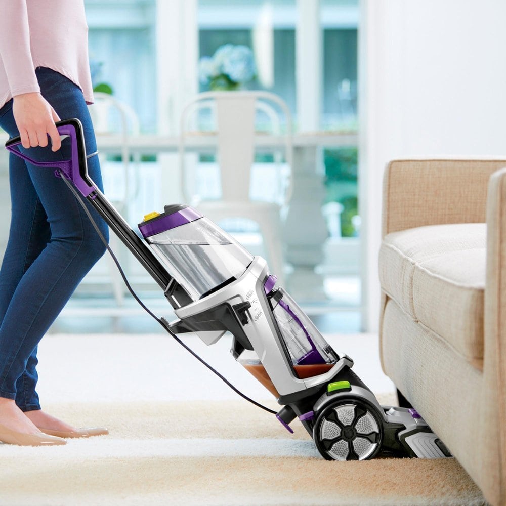 woman Cleaning with BISSELL ProHeat 2X Revolution Pet Pro Upright Deep Cleaner