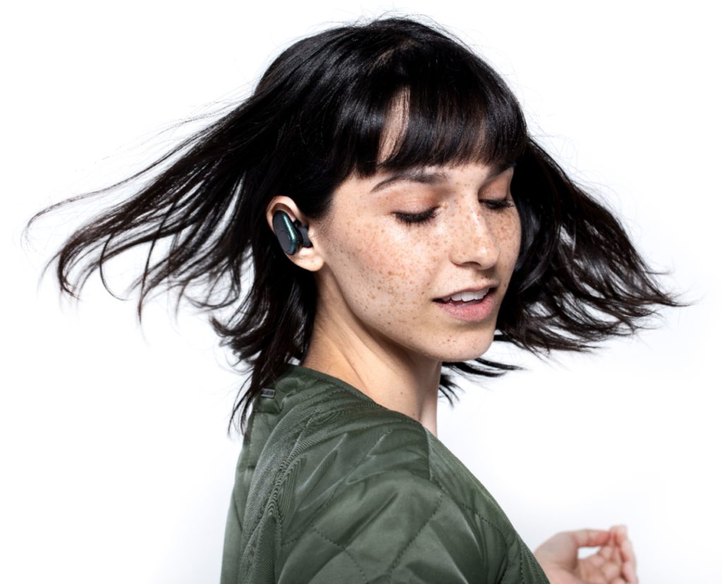 woman wearing Skullcandy Push Earbuds