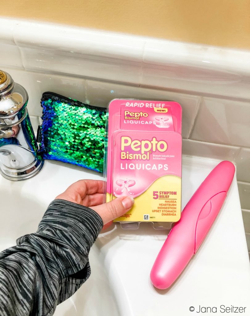 pepto bismol liquicaps in a hotel bathroom